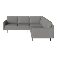 Modern gray sectional sofa with clean lines and minimalistic design, featuring smooth fabric and sleek black legs.