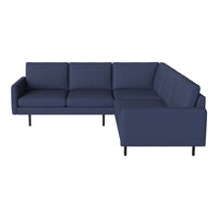 Navy blue sectional sofa with a textured pattern and sleek black legs, perfect for modern living spaces.