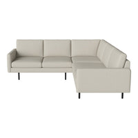 Beige sectional sofa with a modern design, featuring clean lines and a smooth, textured fabric.