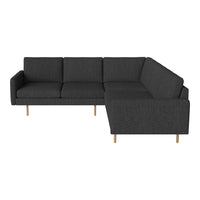 Dark gray sectional sofa with clean lines and wooden legs, featuring a textured fabric for added depth.