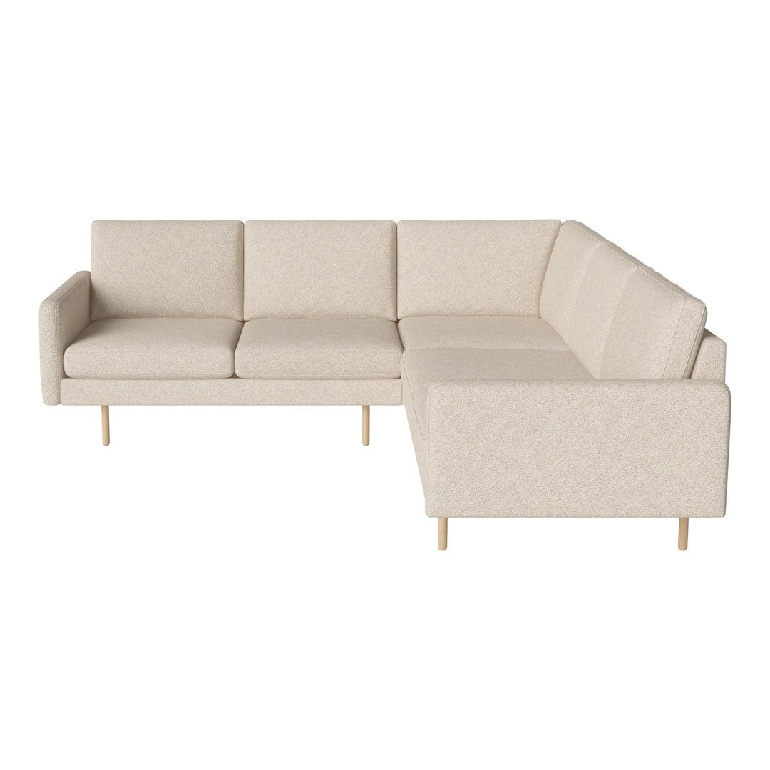 Beige sectional sofa with a textured fabric and light wooden legs, featuring a minimalist design and clean lines.
