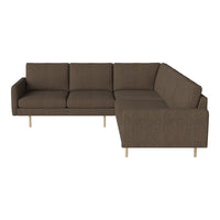 "Brown textured sectional sofa with clean lines and light wooden legs, ideal for modern living spaces."