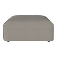 Taupe upholstered ottoman with a smooth texture and rounded edges, perfect for modern decor.
