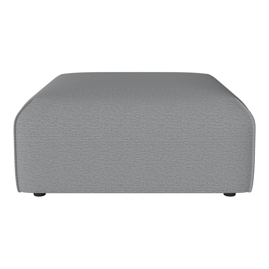 Gray upholstered ottoman with a subtle textured pattern and rounded edges, perfect for modern living spaces.