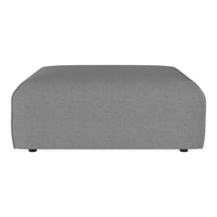 Gray upholstered ottoman with a smooth, minimalist design, featuring subtle texture and rounded edges.