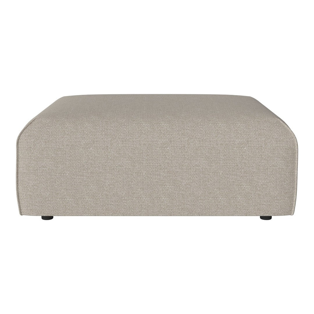 Light beige textured ottoman with a minimalistic design and smooth, rounded edges. Perfect for modern decor.