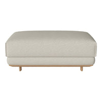Neutral beige ottoman with a subtle woven texture and natural wooden legs, perfect for versatile decor styles.