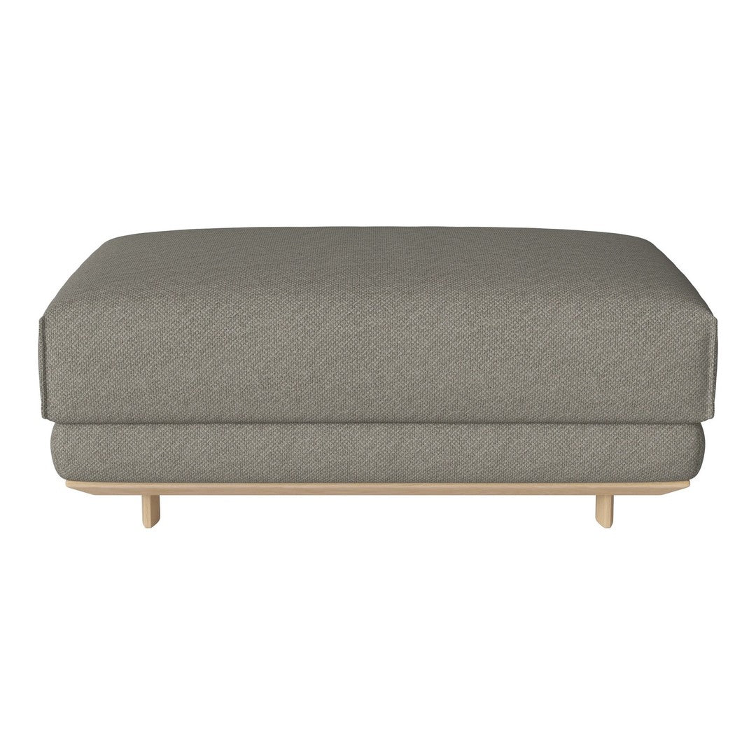 Gray upholstered ottoman with a textured pattern and wooden legs, ideal for stylish living room decor.