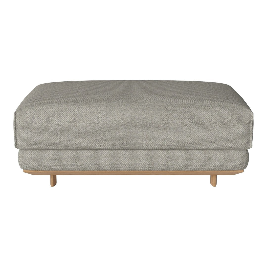 Gray upholstered ottoman with subtle texture, featuring a minimalist design and light wood legs.