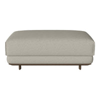 Light beige ottoman with a smooth texture and minimalist design, featuring a solid wood base and no visible patterns.