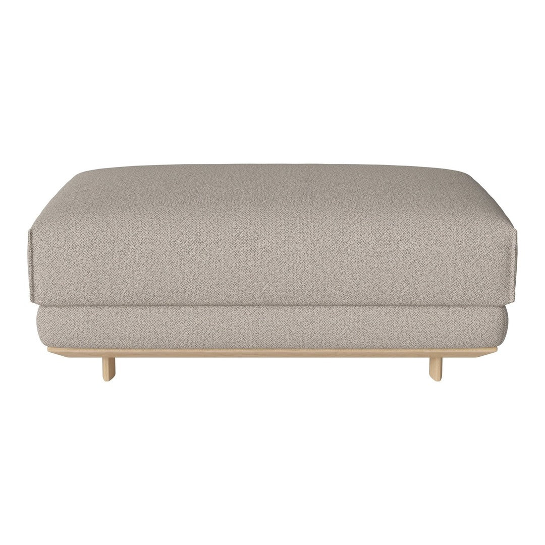 Light beige upholstered ottoman with subtle texture, featuring a minimalist design and natural wood legs.