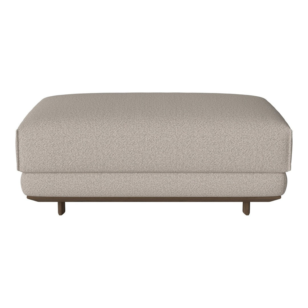 Beige textured ottoman with a smooth, solid surface and wooden legs, perfect for modern living spaces.