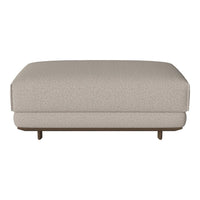 Beige textured ottoman with a smooth, solid surface and wooden legs, perfect for modern living spaces.