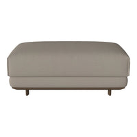 Light beige upholstered ottoman with clean lines and a minimalist design, featuring wooden legs.