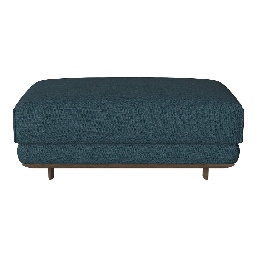 Dark teal upholstered ottoman with a sleek, minimalist design and wood legs. Ideal for modern decor.