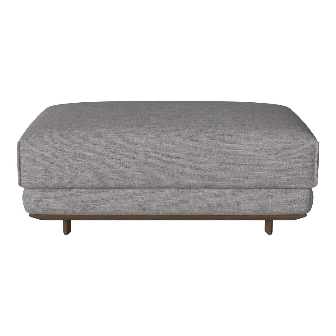Gray upholstered ottoman with a clean, minimalist design and subtle texture, featuring a sleek wooden base.