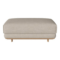 Light beige upholstered ottoman with a smooth texture and simple, contemporary design.