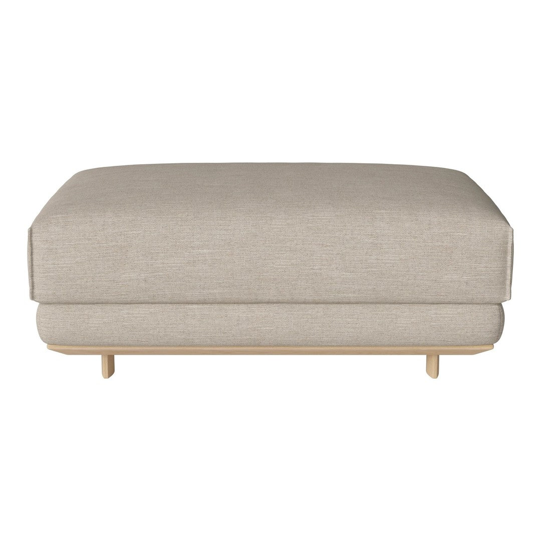 Light beige ottoman with a smooth fabric texture and minimalist design, featuring wooden legs for a modern look.