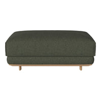 Dark green upholstered ottoman with subtle textured pattern, featuring natural wooden legs. Perfect for modern decor.