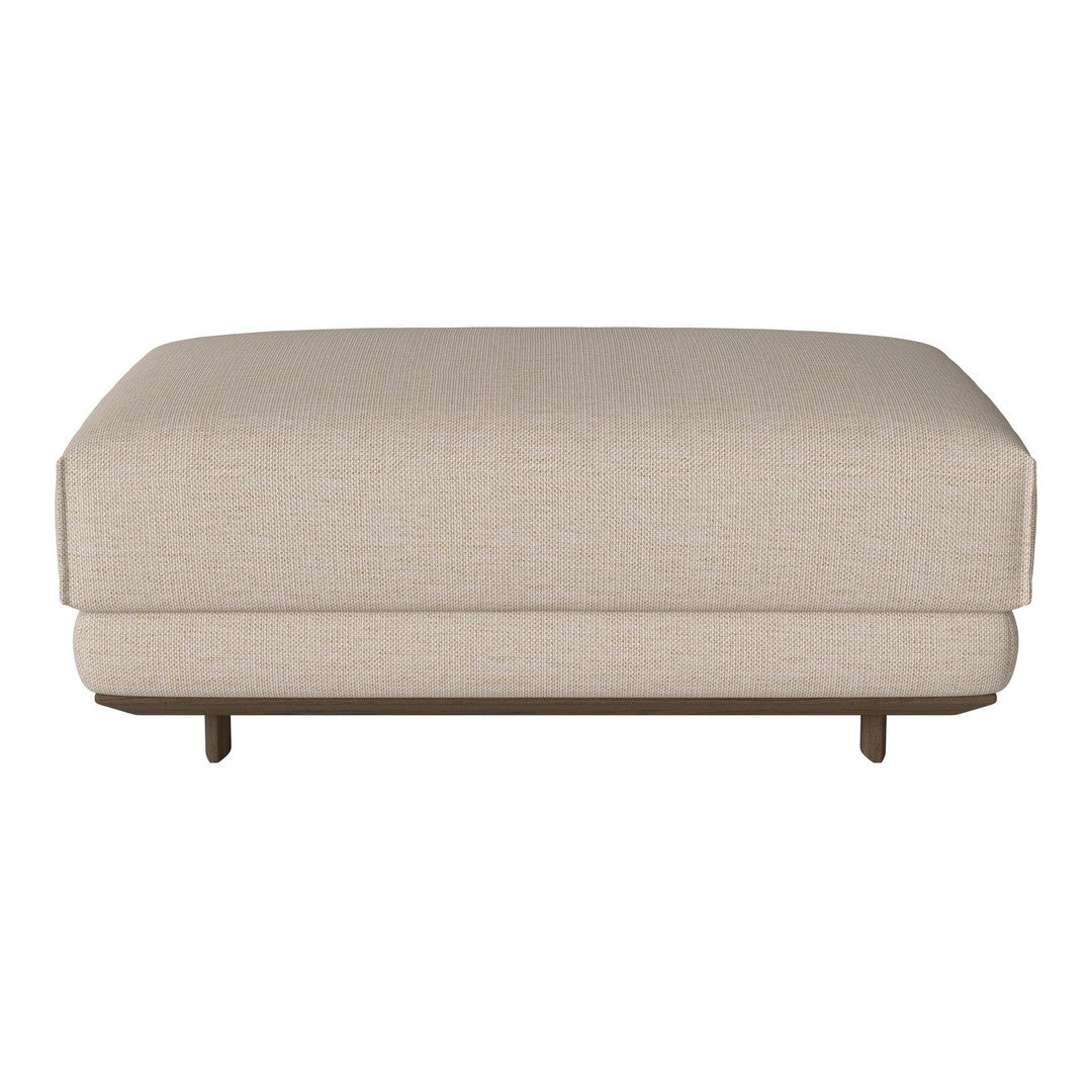 Beige textured ottoman with a modern design and minimalist style, featuring subtle stitching and wood legs.