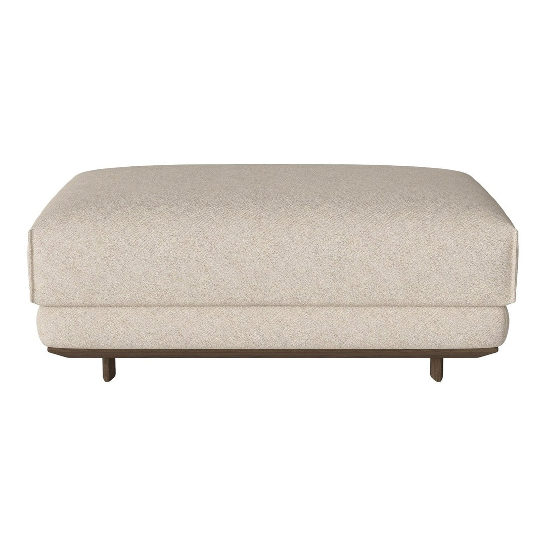 Beige upholstered ottoman with subtle texture and minimalist design, featuring a low-profile silhouette and wooden legs.