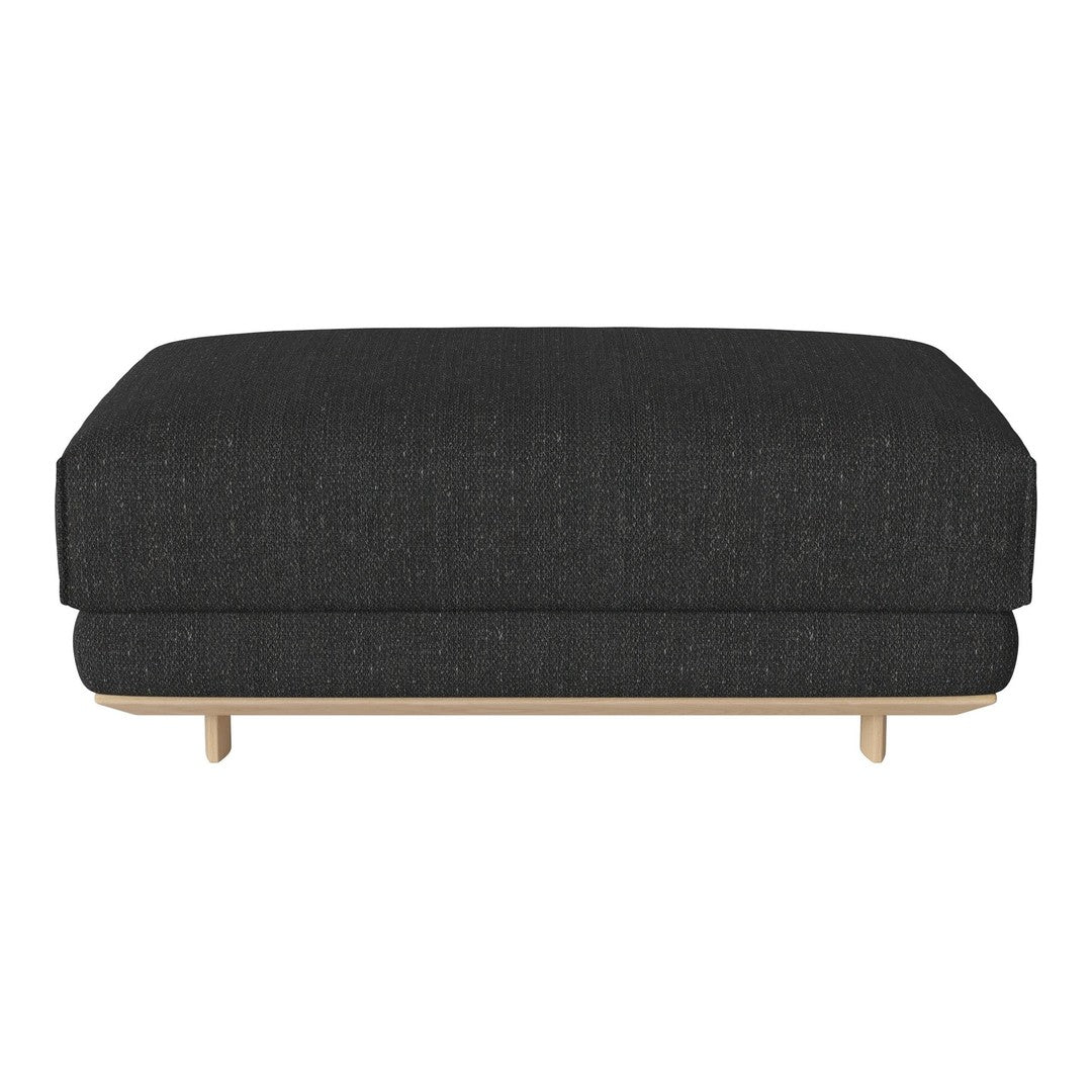 Modern black ottoman with a textured fabric and minimalist wooden legs. Perfect for contemporary decor.