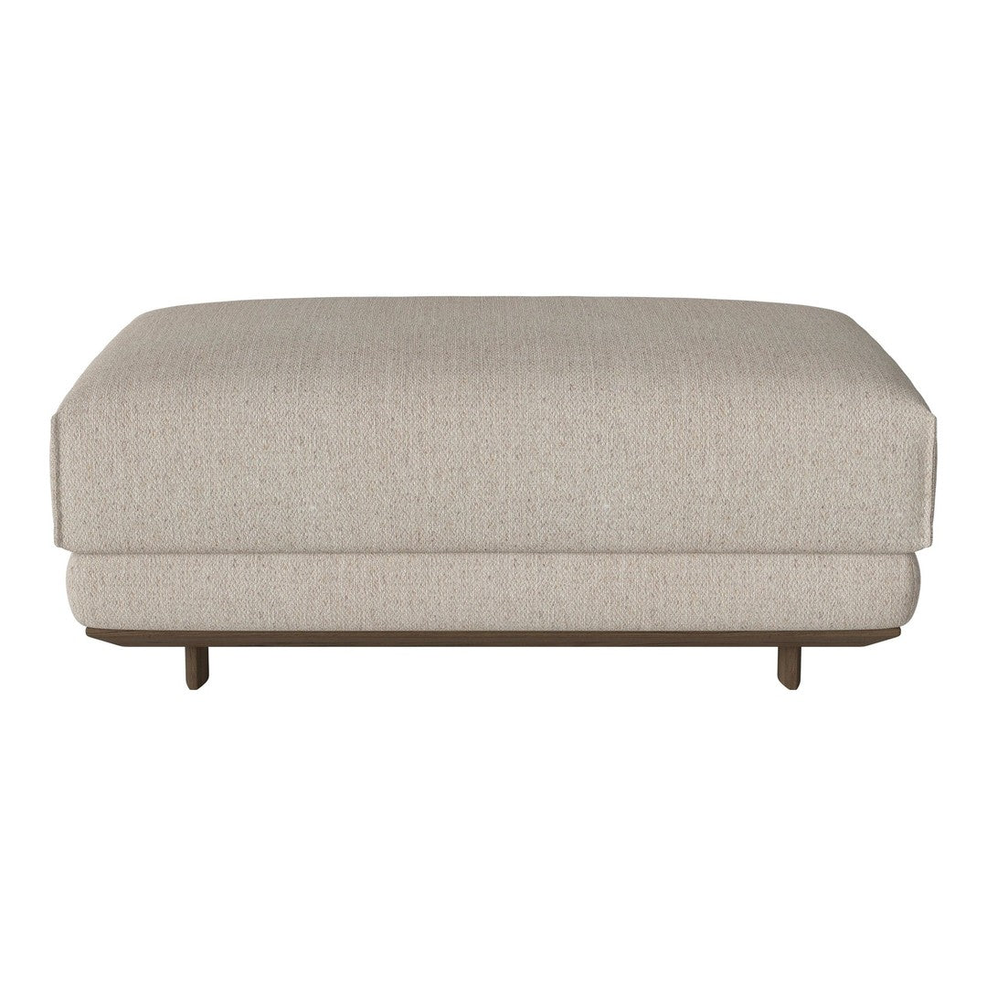 Beige upholstery ottoman with subtle textured pattern and wooden base, perfect for modern living spaces.