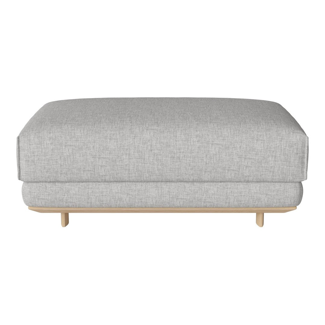 Grey fabric ottoman with a smooth texture and light wood legs, perfect for modern interior decor.