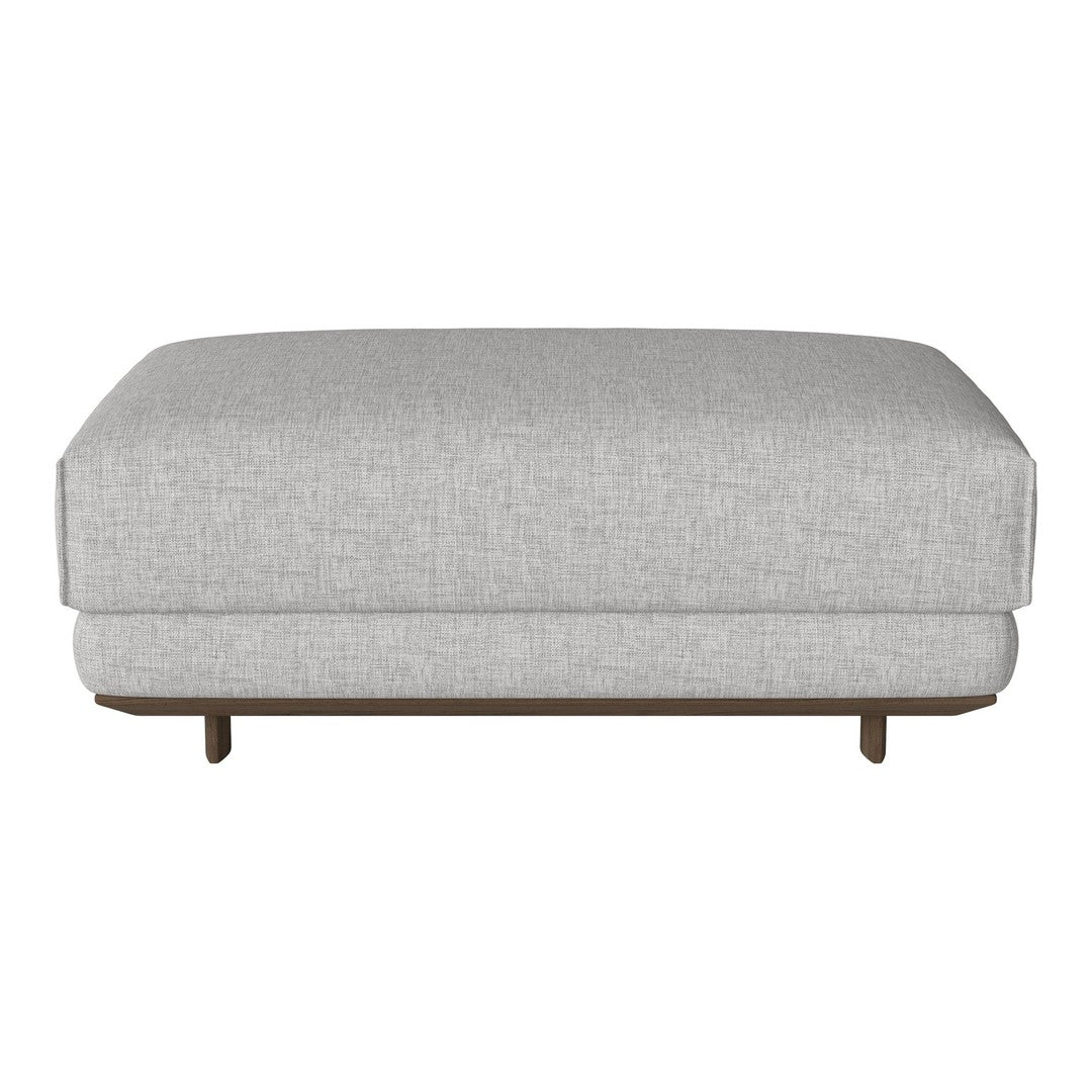 Light gray upholstered ottoman with a minimalistic design and natural wood feet. Perfect for modern decor.