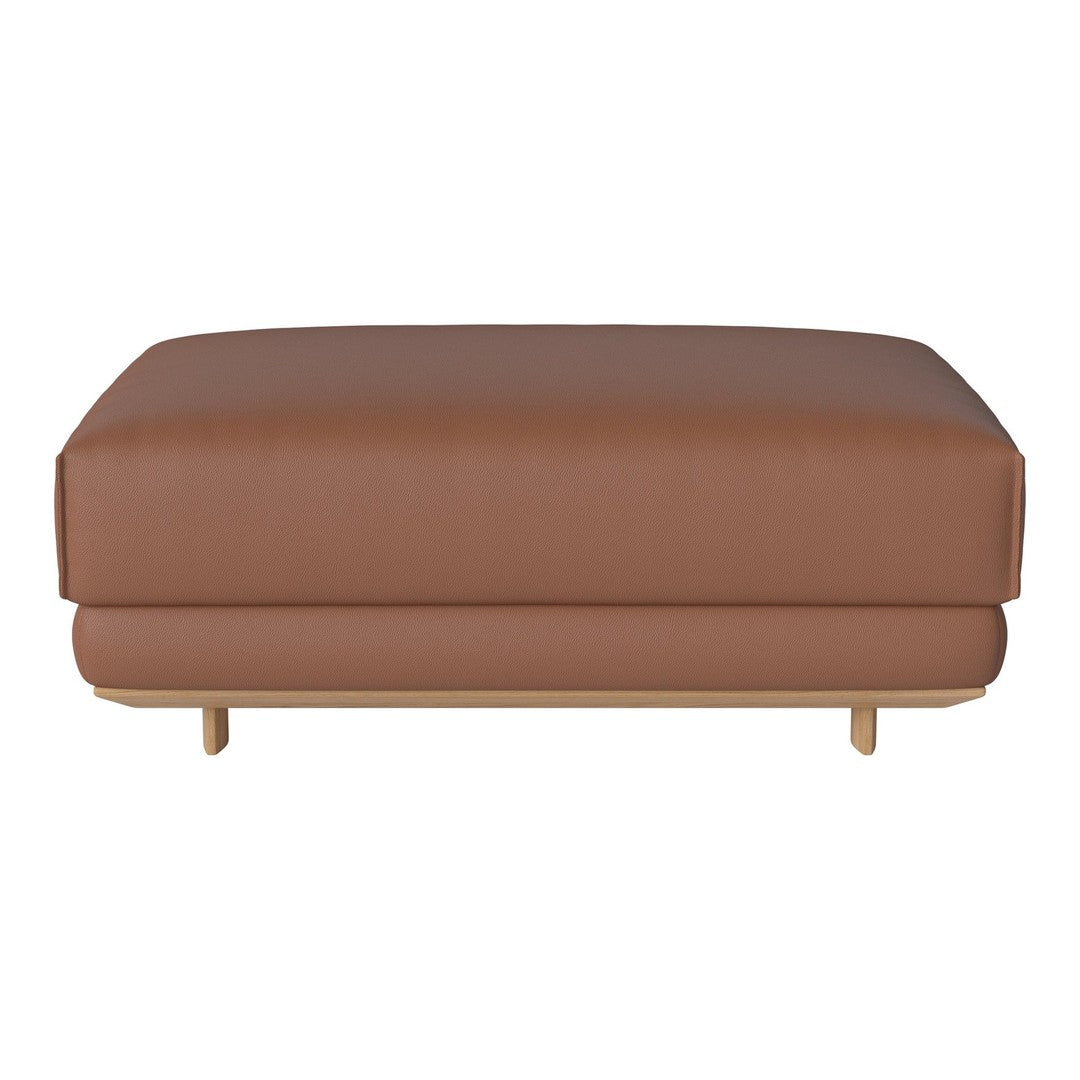"Brown leather ottoman with smooth texture and minimalist design, featuring wooden legs."