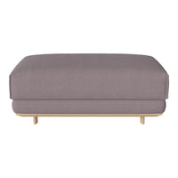 Gray upholstered ottoman with a smooth, minimalist design and light wooden legs. Perfect for modern decor.