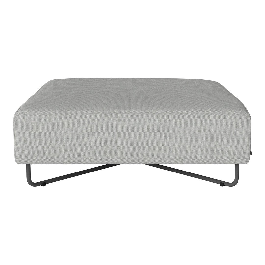 Light gray upholstered ottoman with a sleek, minimalist design and contrasting black metal legs.