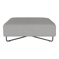 Gray upholstered ottoman with a smooth texture and minimalist design on black metal legs.