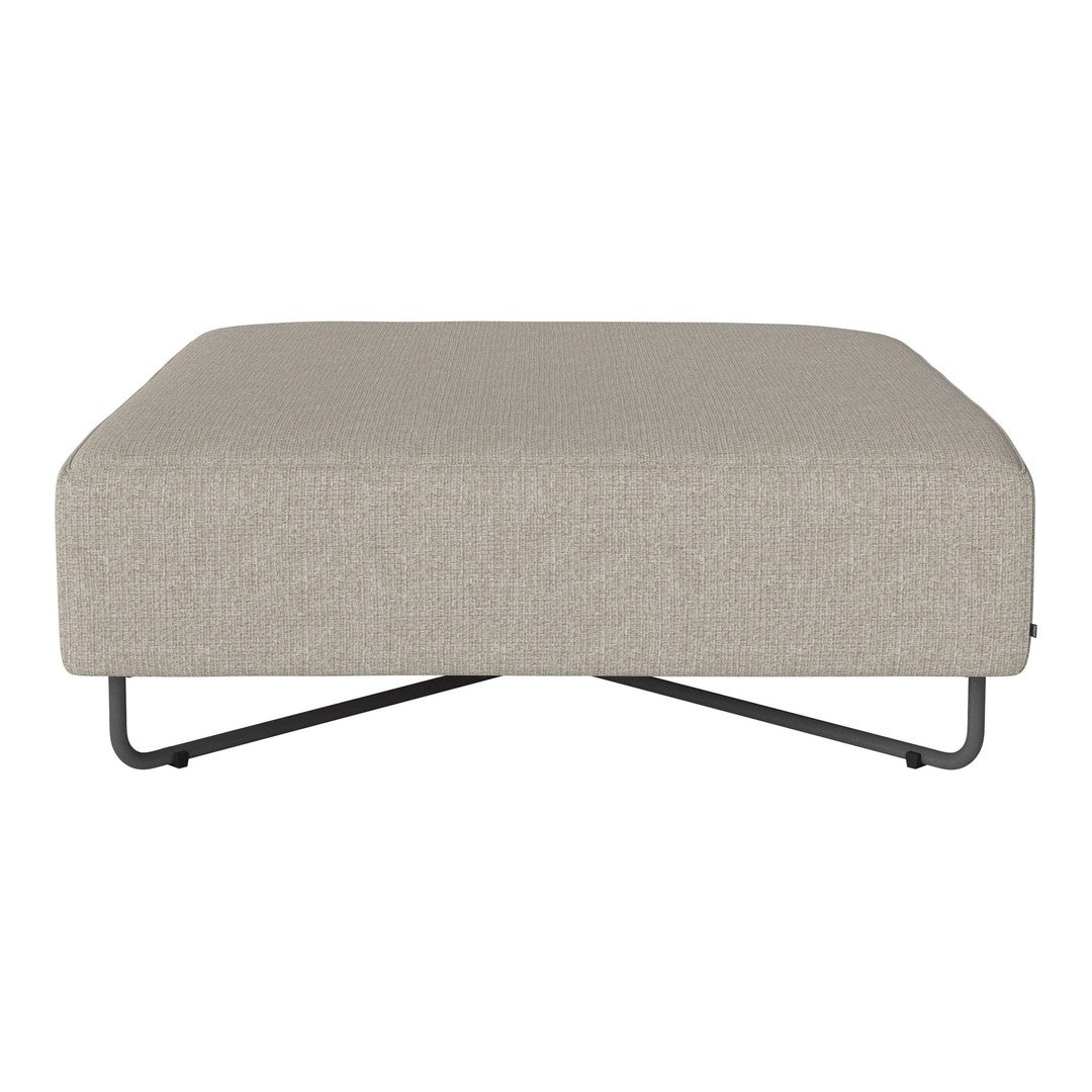 Beige upholstered ottoman with a smooth texture and black metal base. Modern minimalist design for versatile decor.