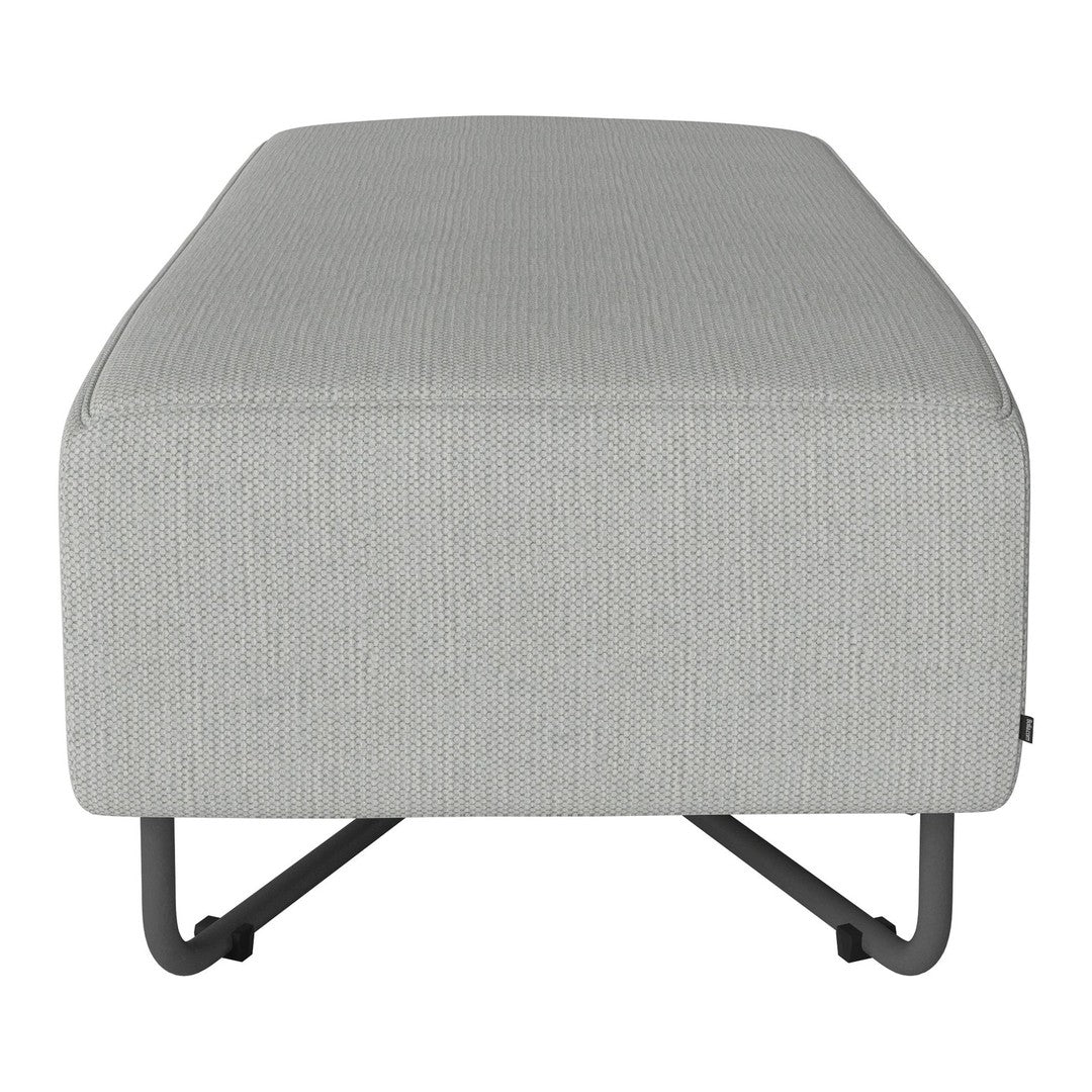 Gray upholstered ottoman with subtle vertical stripes and a sleek metal base. Perfect for modern decor.
