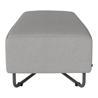 Gray upholstered ottoman with clean lines and a minimalist design on a sleek black metal base.