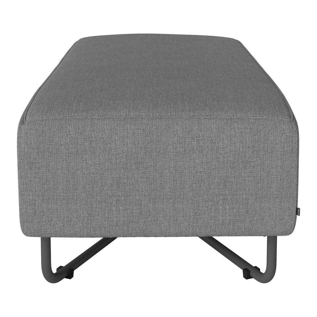 Gray upholstered ottoman with a sleek, modern design and contrasting black metal legs.