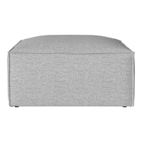 Gray textured ottoman with a modern, minimalist design, perfect for contemporary home decor.