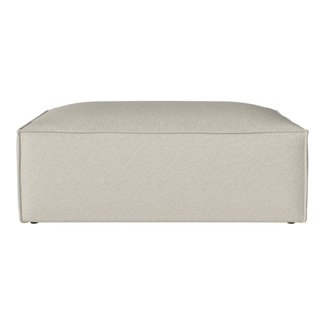Neutral beige ottoman with a soft textured fabric pattern, perfect for modern home decor.