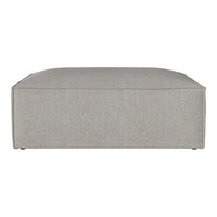 Gray upholstered ottoman with a seamless, minimalist design and subtle texture. Ideal for modern decor.