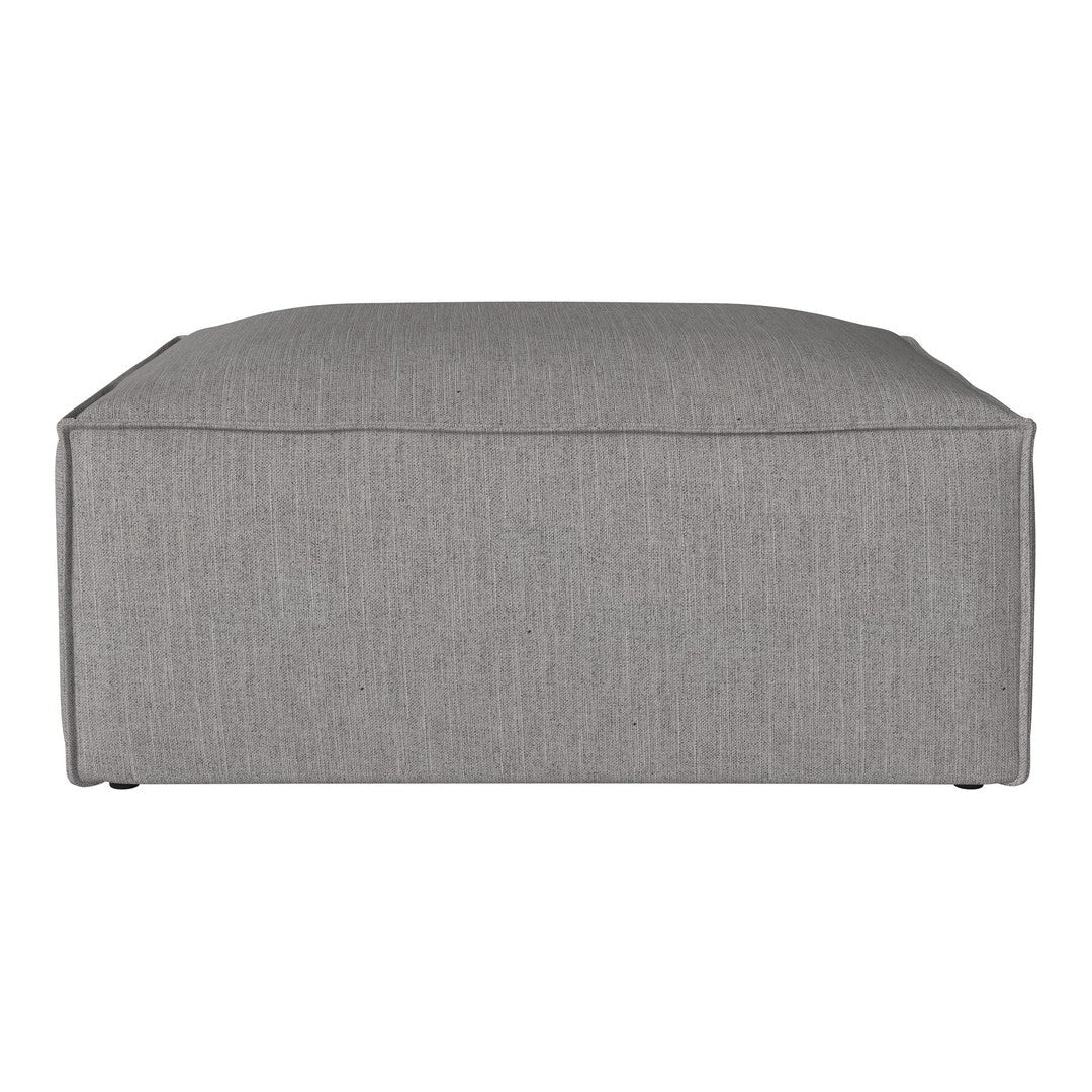Gray upholstered ottoman with a subtle textured pattern, adding a modern touch to any space.