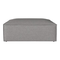 Gray rectangular ottoman with a smooth, minimalist design in a textured fabric. Ideal for modern decor.