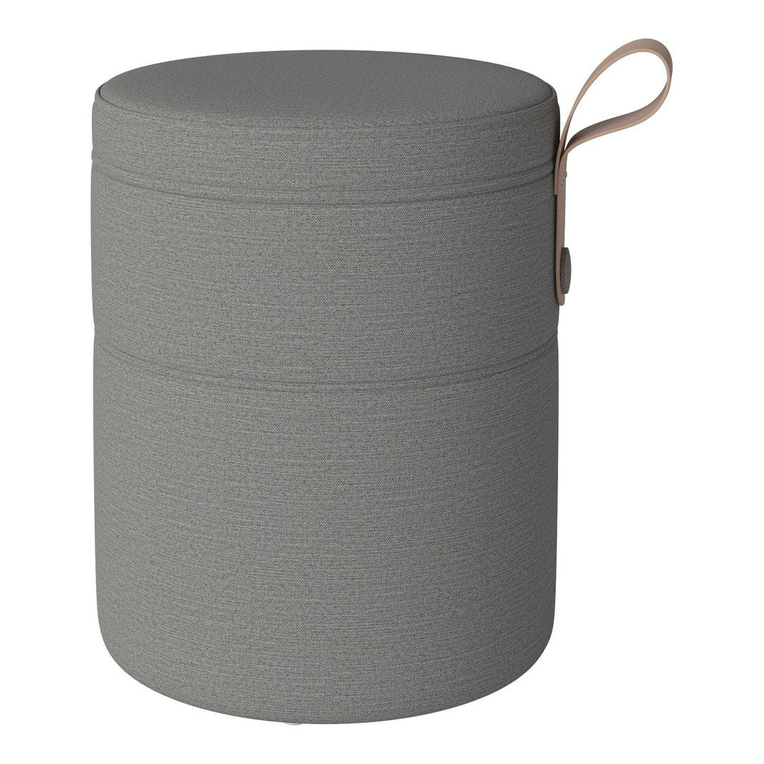 Gray textured storage container with a sleek round shape and a handy side handle. Ideal for organizing your space.