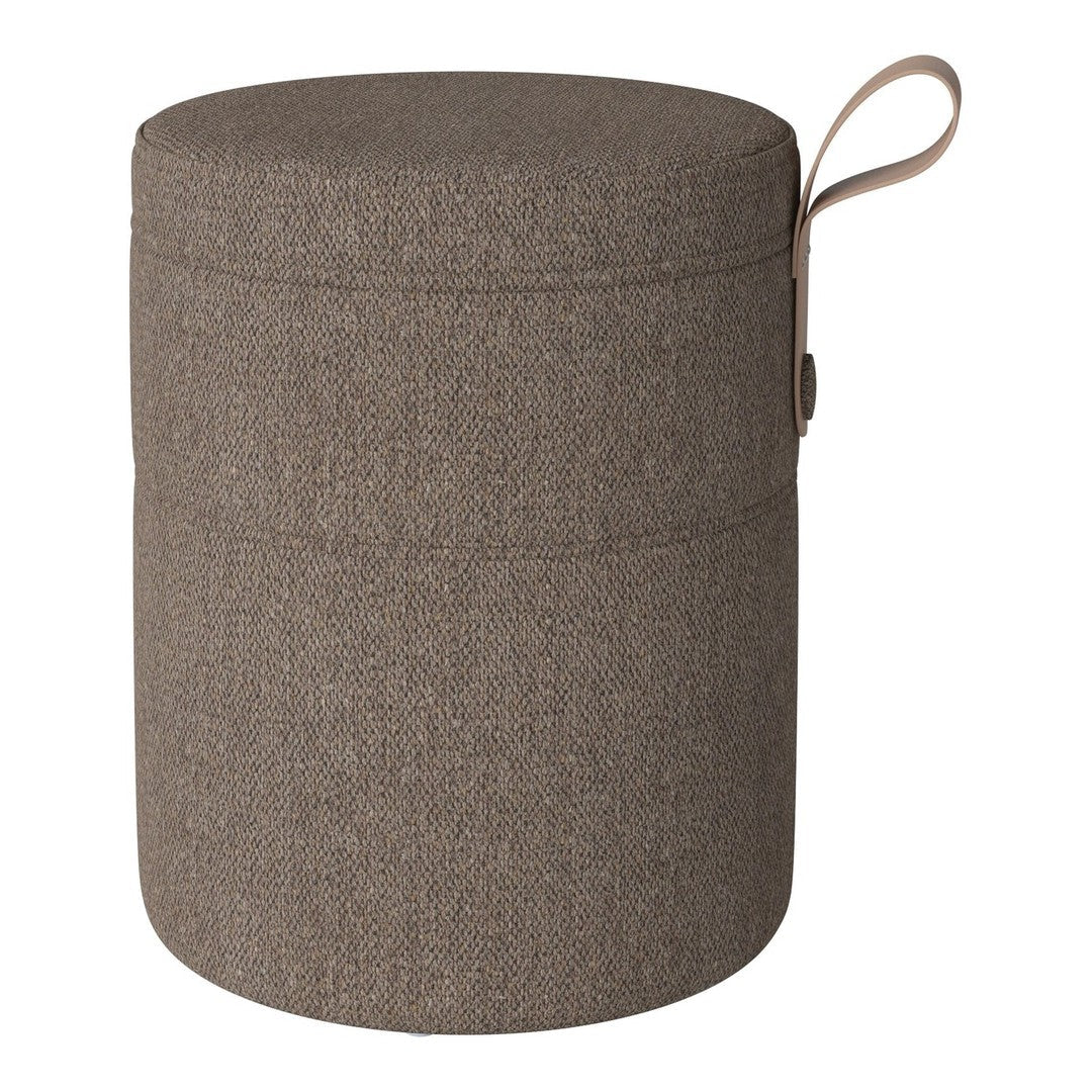 Round storage ottoman in a textured brown fabric with a subtle weave pattern and a convenient side handle.
