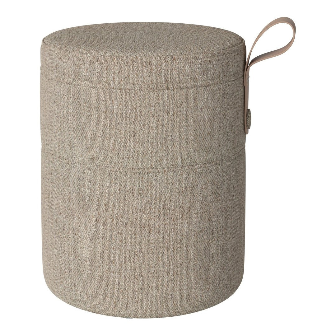 Beige cylindrical storage ottoman with a textured pattern and a stylish leather handle. Perfect for modern decor.