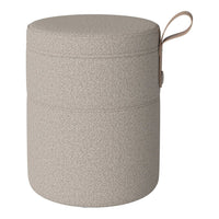 Round storage container in light beige with a textured surface and matching handle.