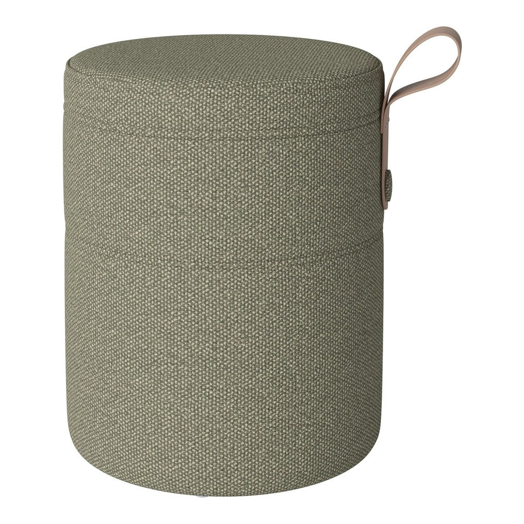 Green textured pouf with a subtle pattern and a tan leather handle. Ideal for versatile home decor.