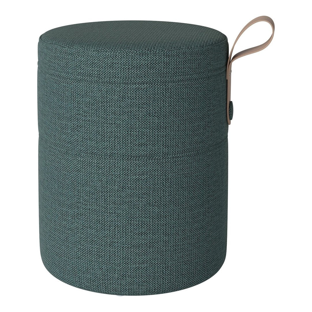 Teal upholstered storage ottoman with textured fabric and beige handle detail. Ideal for stylish home organization.