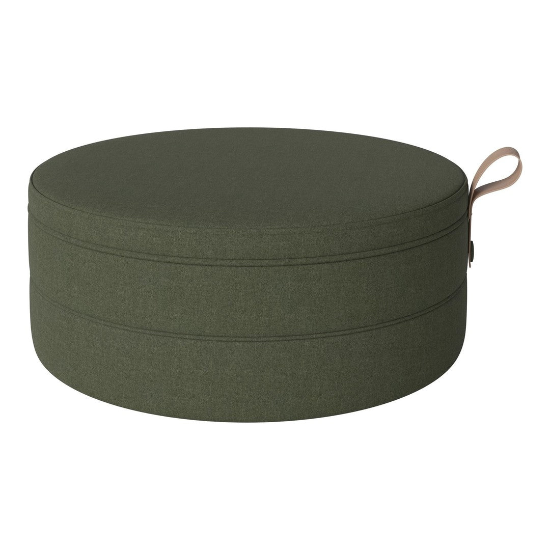 Round olive green pouf with a textured fabric and a subtle pattern, featuring a stylish carrying handle.