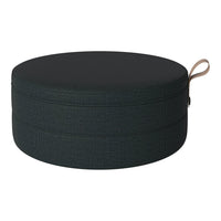 Round storage box in textured dark green with a smooth black lid and a stylish tan handle.